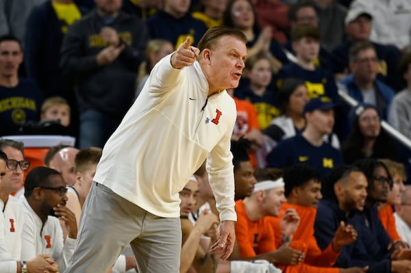 Illinois head coach Brad Underwood yells toward the court during the first half of an NCAA college basketball game against Michigan, Sunday, March 2, 2025, in Ann Arbor, Mich. (AP Photo/Jose Juarez)