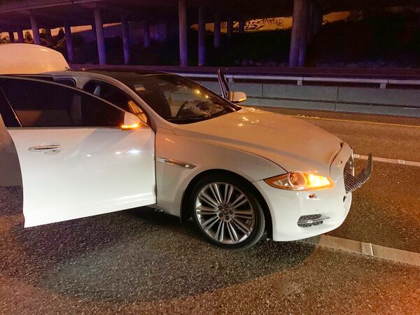 This early Saturday, July 4, 2020 photo provided by the Washington State Patrol shows the vehicle of Dawit Kelete who is suspected of driving into a protest on Interstate 5 in Seattle. Seattle has been the site of prolonged unrest following the May 25 police killing of George Floyd in Minneapolis. (Washington State Patrol via AP)