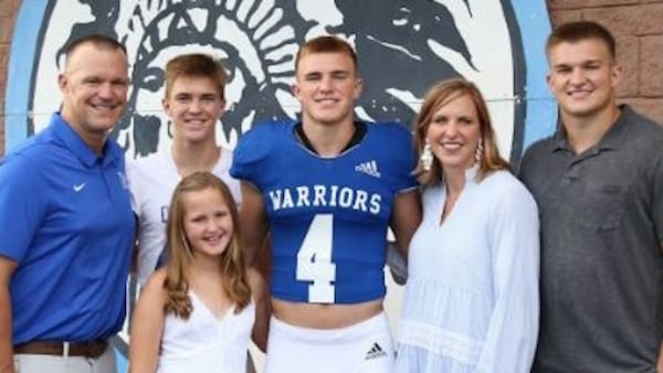 Former Georgia offensive lineman David Weeks (left) and his family (son Zach, daughter Kate, son Whit, wife Erin and son West) will cheer for LSU in the SEC Championship game against Georgia. West is a linebacker, and Whit is a commitment for the Tigers.