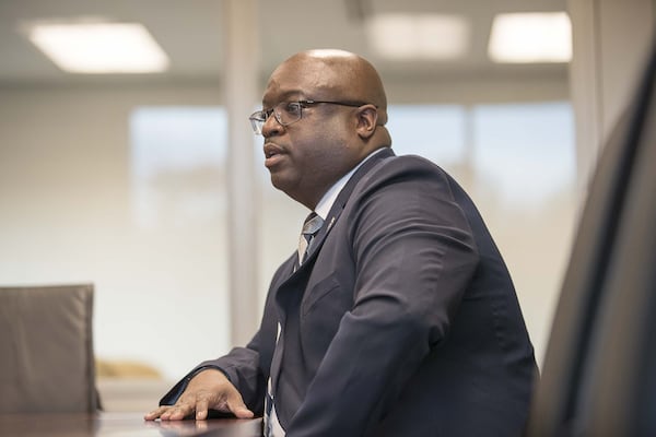 Ahmed Holt, assistant commissioner of the Facilities Division of the Georgia Department of Corrections, speaks about in-house programs available for self-proclaimed gang members during a visit to the Metro Reentry Facility near Atlanta on March 11, 2020. (ALYSSA POINTER/ALYSSA.POINTER@AJC.COM)