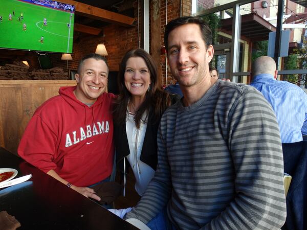 Sandra Golden at Stats earlier this month with former producer Jason Cofar (left) and co-host Brian Finneran. CREDIT: Rodney Ho/ rho@ajc.com