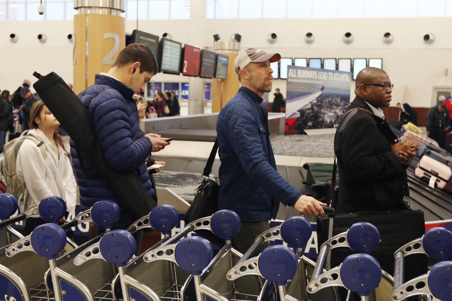 PHOTOS: Atlanta airport travelers stuck in long TSA wait lines