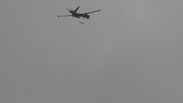 In this image made from video released by South Korea Defense Ministry, U.S. Air Force MQ-9 Reaper drone, releases a GBU-38 Joint Direct Attack Munition (JDAM) during a joint live-fire exercise between South Korea and the U.S. at an undisclosed location, Friday, Nov. 1, 2024. (South Korea Defense Ministry via AP)