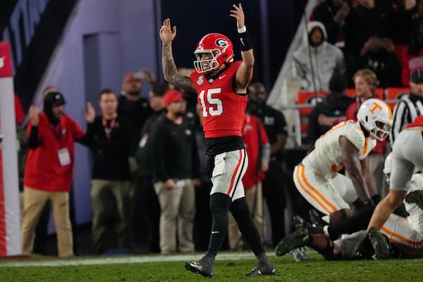 Georgia quarterback Carson Beck (15) reacts after a Georgia touchdown during the second half of an NCAA college football game against Tennessee, Saturday, Nov. 16, 2024, in Athens, Ga. (AP Photo/John Bazemore)