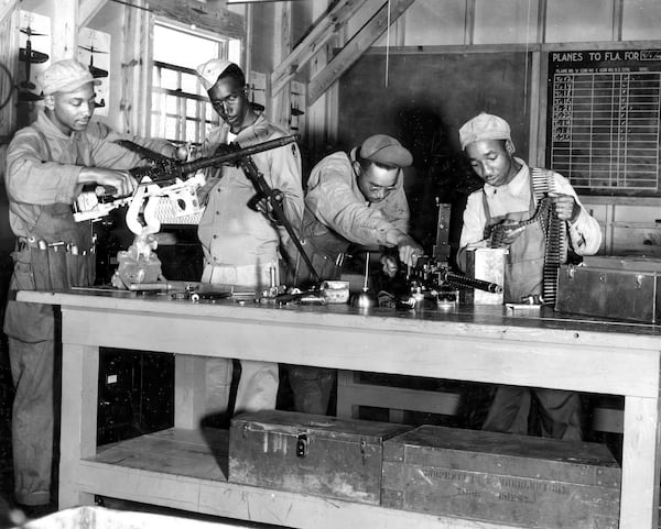 In this image provided by the U.S. Air Force, armorers and other ground personnel undergo training at Chanute Field, Ill., during World War II (U.S. Air Force via AP)