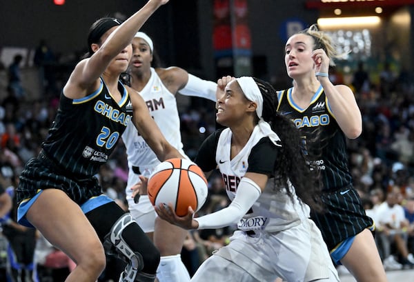 Atlanta Dream guard Jordin Canada (3) drives against Chicago Sky forward Isabelle Harrison (20) during the second half. (Hyosub Shin / AJC)