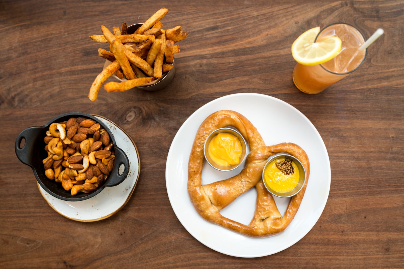 Sceptre Brewing Arts Mesquite Frites, Smoked Nuts, and Pretzel snacks with a Peter Buck cocktail.