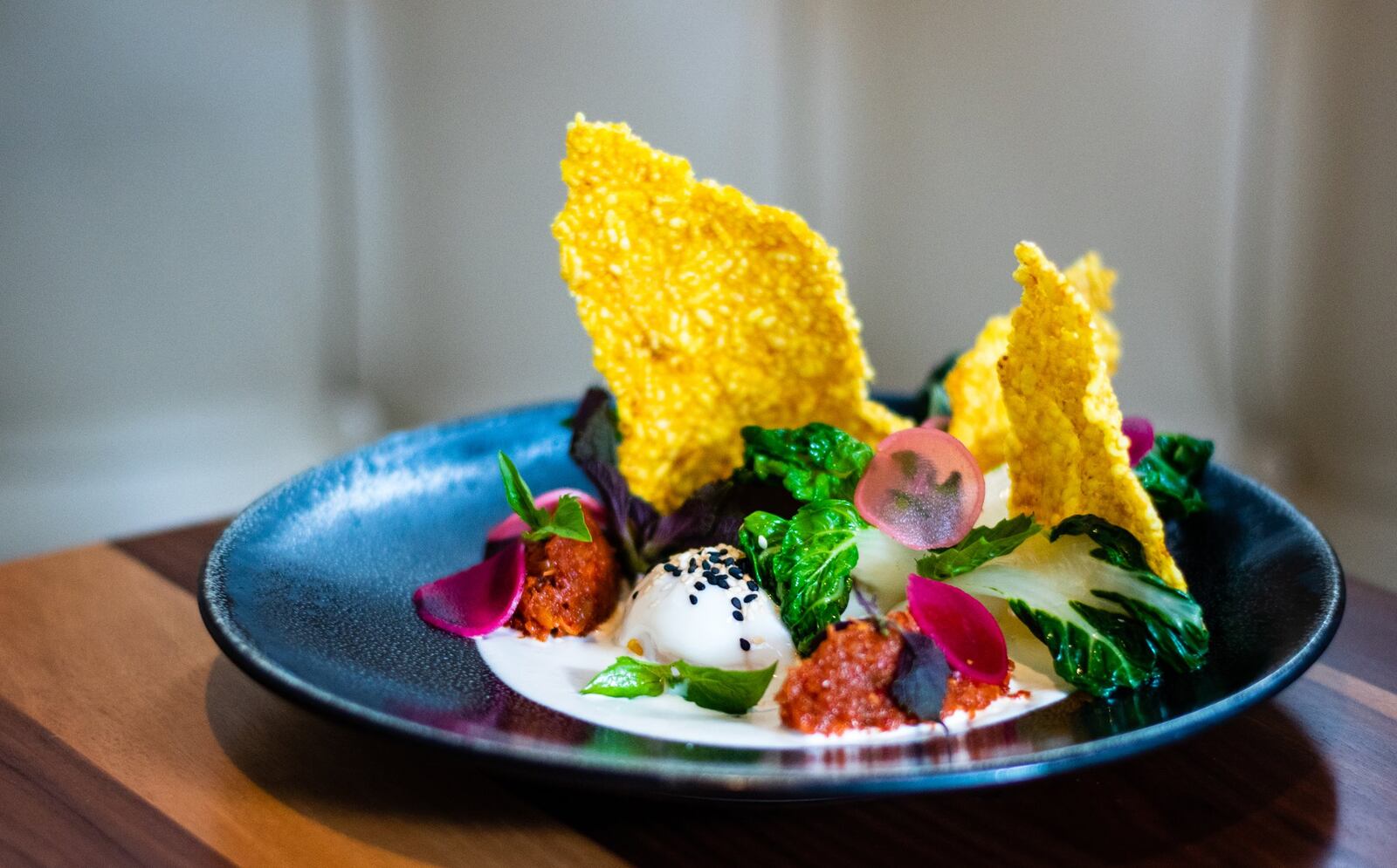 The Pan Asian Egg at the Alden is a coddled egg served with bok choy, ginger and sculptural rice crackers. CONTRIBUTED BY HENRI HOLLIS