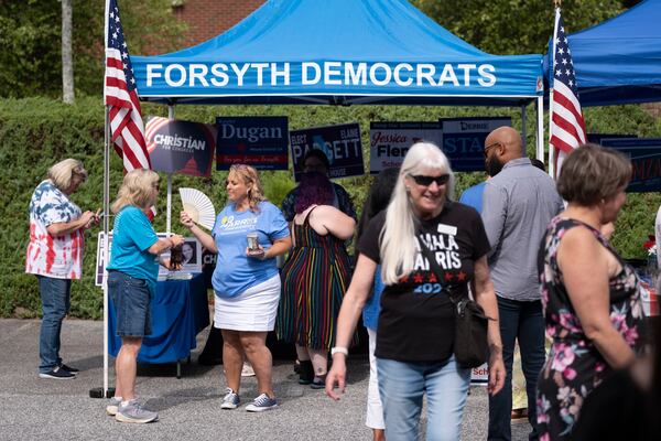 Democrats gather for the opening of a campaign office in Cumming on Sunday, where Kentucky Gov. Andy Beshear campaigned for Vice President Kamala Harris.