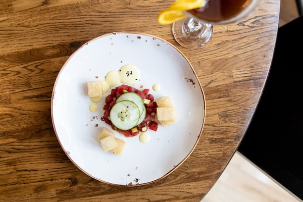 A-street Tuna Poke with yuzu aioli and fried rice tots. (Mia Yakel for The Atlanta Journal-Constitution)