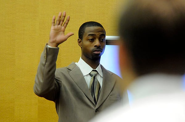 Devonni Manuel Benton takes the oath before he testified that a friend, not he, was the gunman who killed Spelman student Jasmine Lynn.