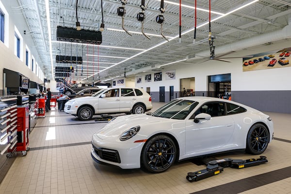 The first freestanding Porsche service center in the United
States has opened its doors near the busy Atlanta airport. The Porsche Service
Center South Atlanta, with 13 lift bays and a design focused on customer comfort
and convenience, is the first step of a multi-million dollar investment in new
features on the campus of Porsche Cars North America, Inc.