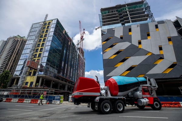 Construction continues on the Midtown Union Project, located at 1331 Spring Street, in Atlanta’s Midtown community, on June 29, 2021. The Midtown Union will be a mixed-use multiple high rise building. (Alyssa Pointer / Alyssa.Pointer@ajc.com)

