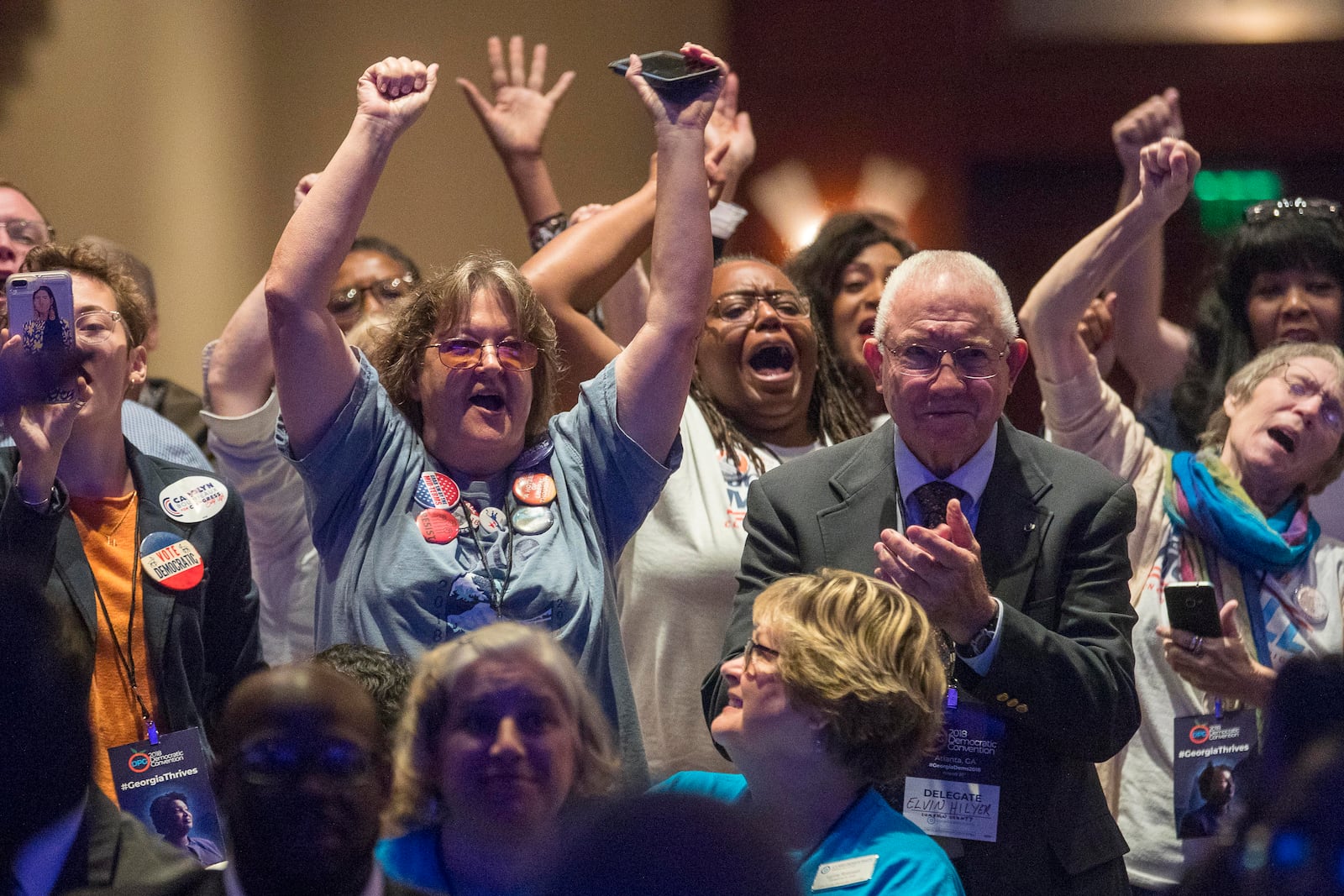 Delegates cheer during the Georgia Democratic Convention  in Atlanta, Saturday, August 25, 2018. (ALYSSA POINTER/ALYSSA.POINTER@AJC.COM)