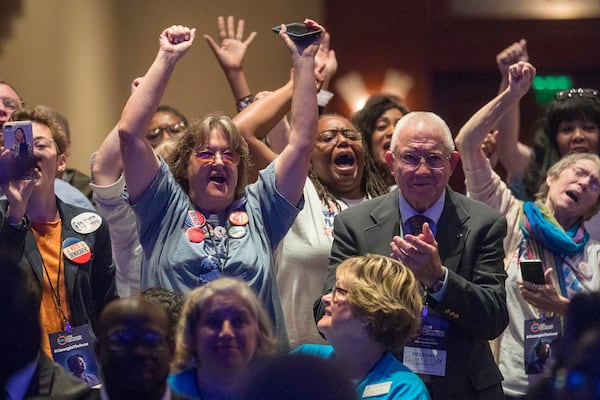 Delegates cheer during the Georgia Democratic Convention  in Atlanta, Saturday, August 25, 2018. (ALYSSA POINTER/ALYSSA.POINTER@AJC.COM)