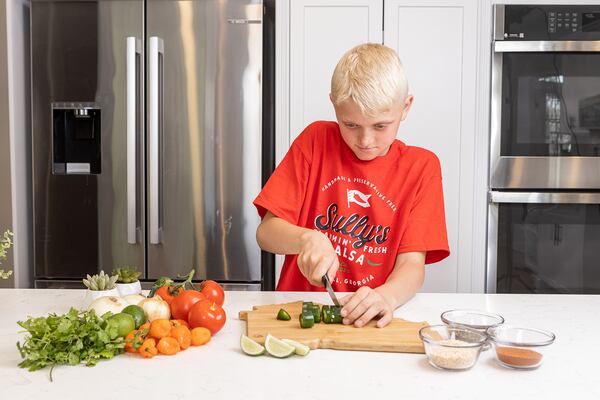 Tyler Sullivan added fresh peppers and his own combination of spices to his dad’s salsa recipe. Courtesy of Jessica Griggs