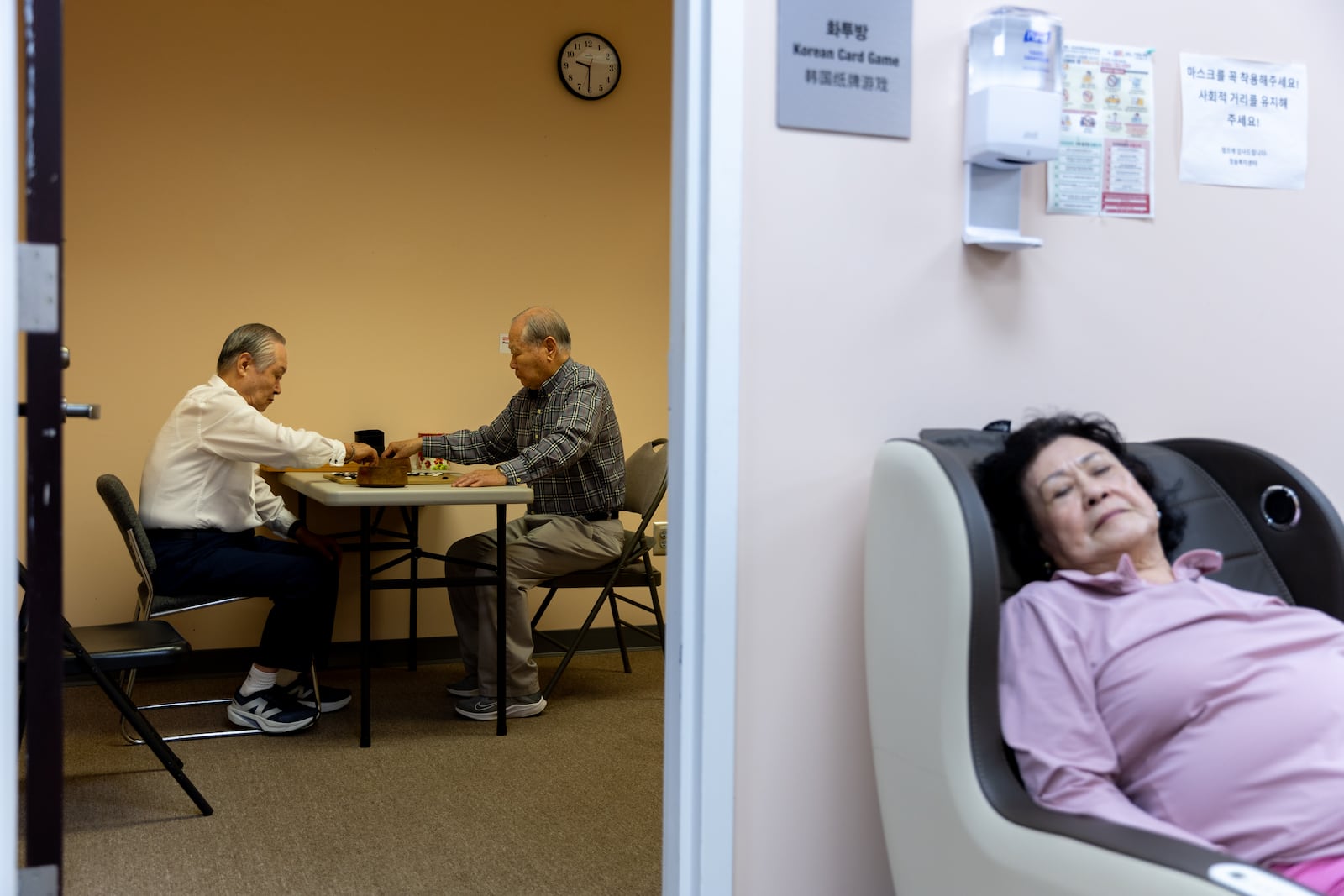 (L-R) Un Kim and Byung Yoo play a board game at Ebenezer Healthcare Services, a Korean senior center in Norcross, on Monday, Oct. 7, 2024. They later attended the event hosted by nonpartisan organization Asian Americans Advancing Justice, which was at the center to register seniors to vote and help them update their registration. Joe Jo, director and owner of the senior center, said he knows the difficulties senior citizens may have with transportation or language barriers. "It was very exciting for (AAAJ) to be here. It was very convenient," he said, adding that nearly 200 seniors and staff members registered to vote that day.