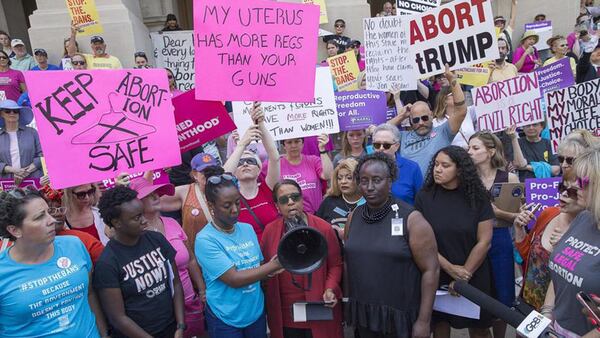 Andrea Young, center, the executive director of the American Civil Liberties Union of Georgia, speaks during an abortion rights rally on the steps of the Georgia State Capitol building in Atlanta.