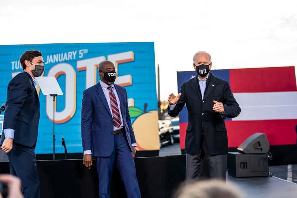 Jon Ossoff and the Rev. Raphael Warnock, Democratic Senate candidates, with President-elect Joe Biden at a rally in Atlanta, Jan. 4, 2021. Senate control opens up new possibilities for Democrats on health care, but the party will still need to contend with arcane rules and the challenges of a narrow majority. (Doug Mills/The New York Times)