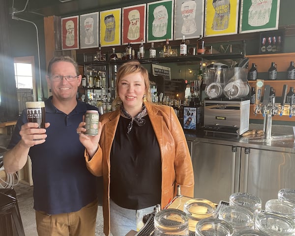 Arches Brewing brewmaster Jamey Adams and Atlanta Utility Works owner Melanie Styles offer customers beer and kombucha. (Bob Townsend for The Atlanta Journal-Constitution)