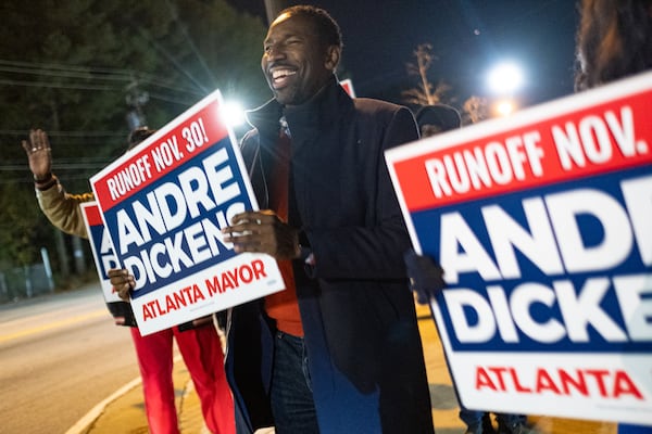 Atlanta mayoral runoff candidate Andre Dickens celebrates with supporters just before the close of polls Nov. 30, 2021, in Atlanta. Ben Gray/AJC  2021