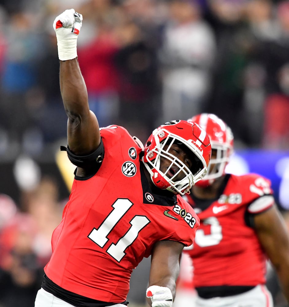 Georgia Bulldogs linebacker Jalon Walker (11) reacts after sacking TCU Horned Frogs quarterback Max Duggan during the second half of the College Football Playoff National Championship at SoFi Stadium in Los Angeles on Monday, January 9, 2023. Georgia won 65-7 and secured a back-to-back championship. (Hyosub Shin / Hyosub.Shin@ajc.com)