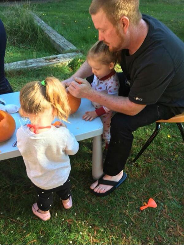 Police say 4-year-old twins Rosaline and Aurora Crider were secured in their car booster seats when their father, Corey Simmons, 47, drove off the road and suffered a fatal head injury. Somehow the girls got out of the wrecked vehicle and crawled 100 feet up a ravine to the road, where a passer-by stopped and rescued them, police said.