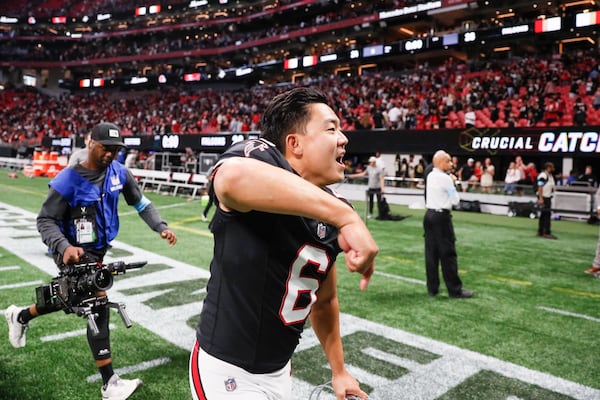 Falcons kicker Younghoe Koo celebrates his game-winning field goal.