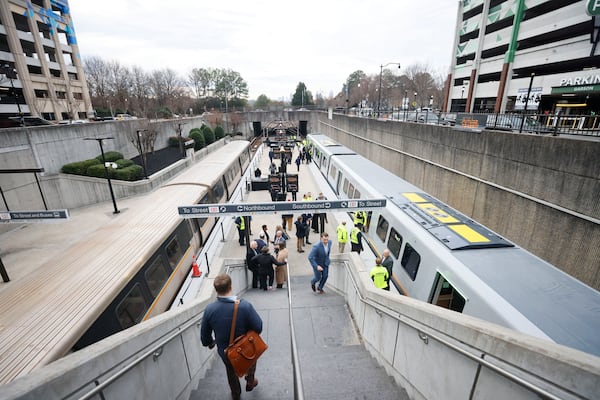 A classic MARTA train arrived on the left while people were touring one of the new MARTA trains on the right at Lindbergh station during the unveiling of these trains on Thursday, January 30, 2025.
(Miguel Martinez/ AJC)