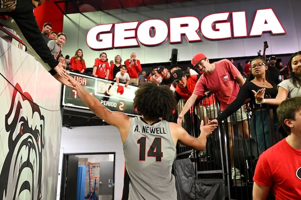 Georgia forward Asa Newell celebrates the 79-68 win over Vanderbilt that closed out the team's regular season.