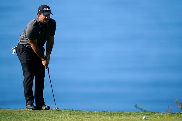 Patrick Reed lines up a putt on the fourth hole of the South Course during the third round of the Farmers Insurance Open Saturday, Jan. 30, 2021, at Torrey Pines in San Diego. (Gregory Bull/AP)