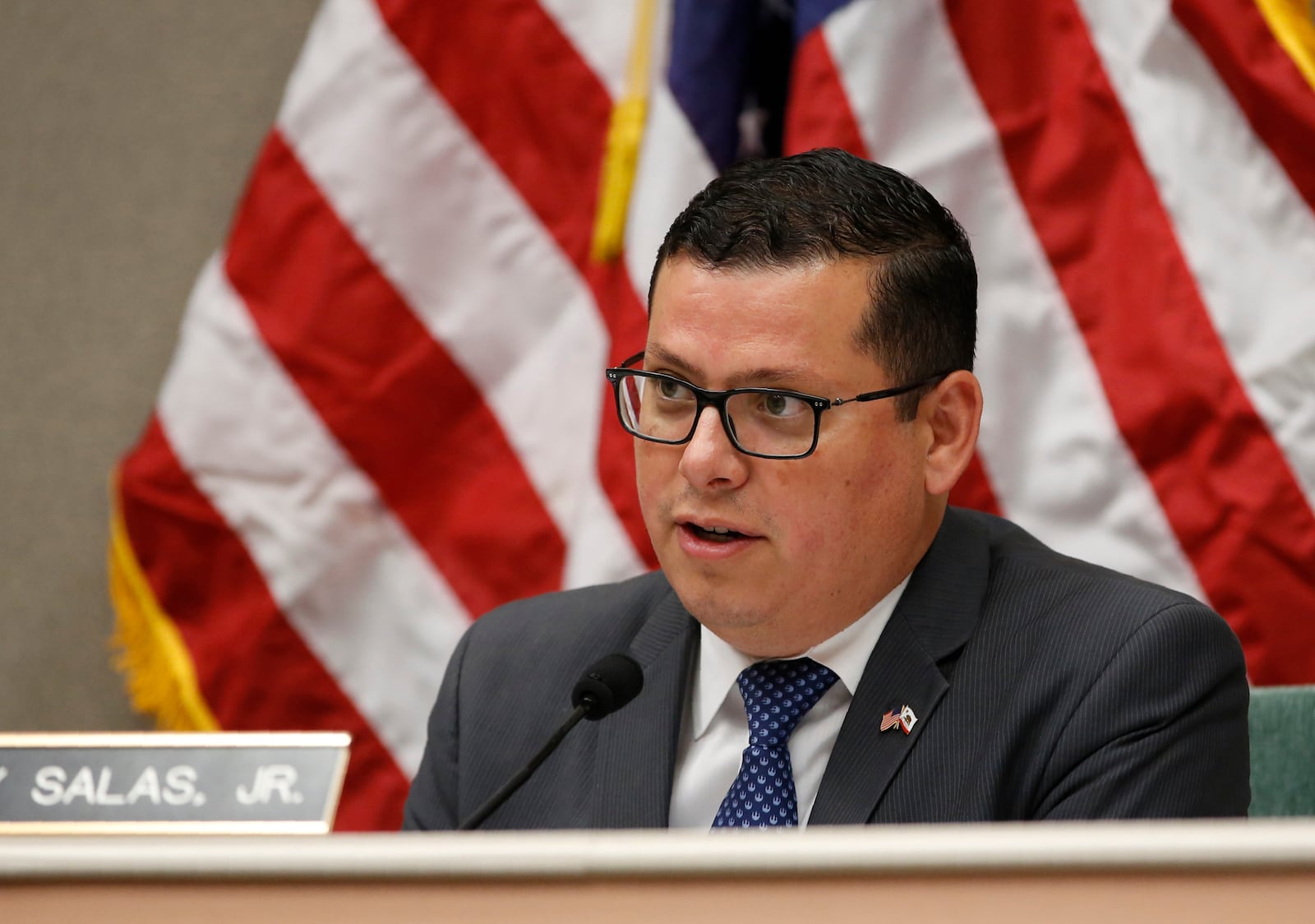 FILE - Assemblyman Rudy Salas Jr., asks questions during a hearing in Sacramento, Calif., Aug. 12, 2019. (AP Photo/Rich Pedroncelli, File)