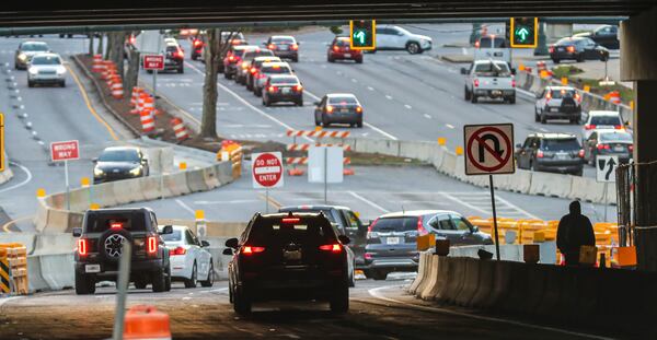 April 17, 2023 Sandy Springs: Motorists seemed to do fine navigating the new diverging-diamond interchange at Abernathy Road under the Ga. 400 overpass on Monday, April 17, 2023. The new Abernathy Road interchange is a key part of the massive construction project surrounding the I-285 interchange at Ga. 400. The project began in 2017 and — after a series of delays — is expected to be completed later this year. (John Spink / John.Spink@ajc.com)

