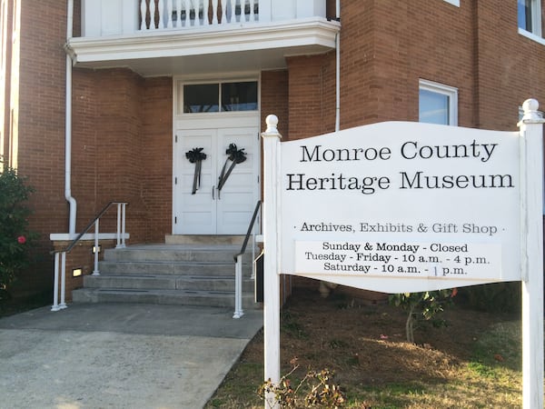 Black ribbons on the doors of the old Monroe County Courthouse, now the Heritage Museum, hang in memory of Harper Lee. Photos: Jennifer Brett