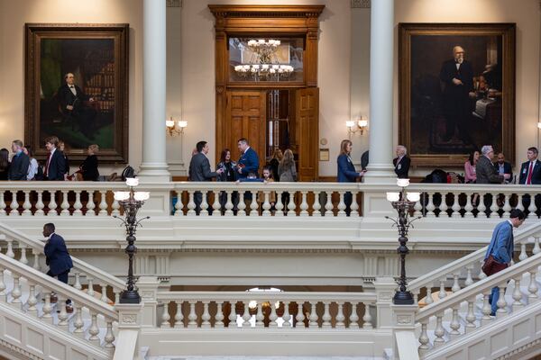 People gather Monday in the Capitol on the first day of the Georgia General Assembly in Atlanta. (Arvin Temkar / arvin.temkar@ajc.com)