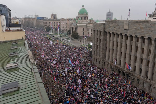 Tens of thousands gather in front of the Serbian parliament during a major anti-corruption rally led by university students in Belgrade, Serbia, Saturday, March 15, 2025. (AP Photo/Marko Drobnjakovic)