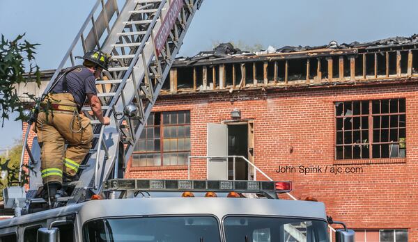 Several streets in downtown Calhoun remain closed as firefighers battle the blaze.