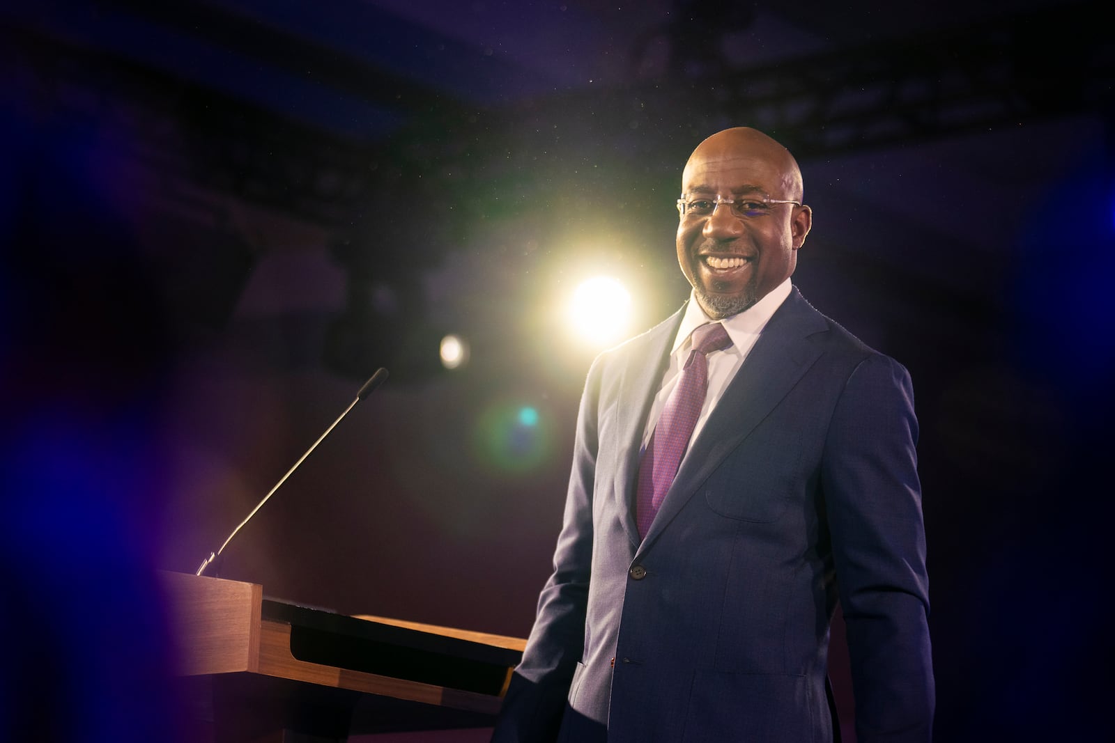 Democratic U.S. Sen. Raphael Warnock speaks to supporters while celebrating his reelection with a victory over Republican Herschel Walker in December's runoff. Warnock got help from hundreds of thousands of swing voters who withheld their support from Walker even thought they cast ballots for other GOP contenders. (Nicole Craine/The New York Times)