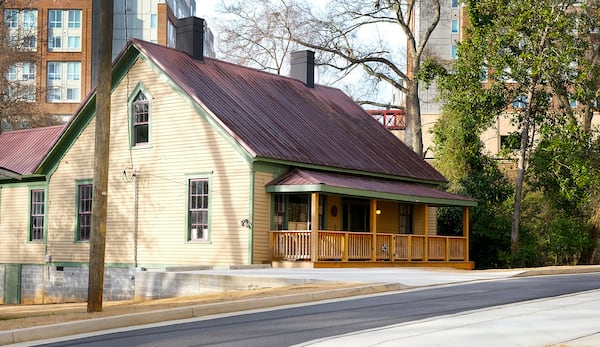 A house in Pottery Town in Athens, GA, surrounded by apartment buildings, previously owned by Patterson Hood of the Drive-By Truckers. The house was moved from the original location because of construction in the area. (Nell Carroll for The Atlanta Journal-Constitution)