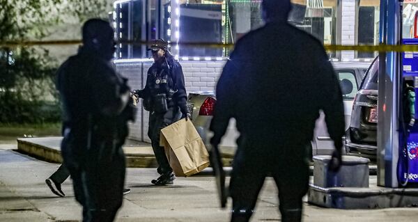 Atlanta police investigate a double shooting Friday morning at an Exxon station on Metropolitan Parkway. One man was killed.