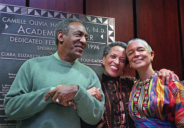 Entertainer Bill Cosby (l) Johnnetta Cole, President of Spelman (c) and Camille Olivia Hanks Cosby (r) share a moment after the unveiling of the plaque honoring Cosby's contribution to build the Cosby Academic Center at Spelman. Ceremonies took place Saturday evening. 02/24/96