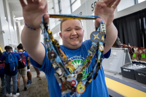 SAVANNAH, GA - JUNE 18, 2024: National Beta Club senior Bull Higginbotham from University View Academy shows off his convention lanyards with dozens of pins he has collected, Tuesday, June 18, 2024, in Savannah, Ga. (AJC Photo/Stephen B. Morton)