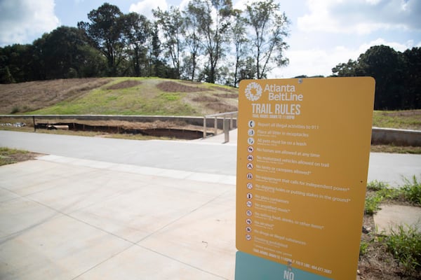 10/13/2021 — Atlanta, Georgia — An informative sign welcomes visitors to the Southside trial of the Atlanta BeltLine in the Pittsburgh community of Atlanta, Wednesday, October 13, 2021. Mayor Keisha Lance Bottoms gathered with leaders from the Beltline, city and community for a ribbon-cutting of the newly paved Southside Trail Tuesday morning. The mixed-use path runs for 0.8 miles from the existing Westside Trail at the end of University Avenue to Pittsburgh Yards, just west of the I-75/85 overpass. (Alyssa Pointer/ Alyssa.Pointer@ajc.com)