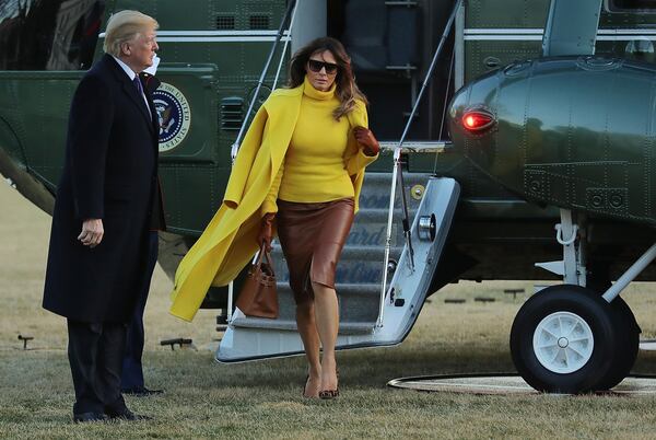 U.S. President Donald Trump (L) and first lady Melania Trump return to the White House after a day trip to Cincinnati, Ohio, February 5, 2018 in Washington, DC. While in Ohio President Trump delivered remarks after touring cylinder manufacturer Sheffer Corporation while the first lady visited patients and their families at Cincinnati Children's Hospital Medical Center.  (Photo by Chip Somodevilla/Getty Images)