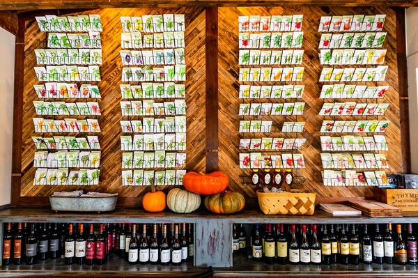 A seed wall greets diners at the entrance of 7 Acre BarNgrill in Milton. The wall behind it is made from the floorboards that were pulled up in the kitchen during renovations. CONTRIBUTED BY HENRI HOLLIS