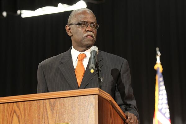 Mayor of the City of South Fulton William “Bill” Edwards speaks to the crowd at the Inauguration Ceremony of the City of South Fulton Mayor & City Council in at B.E. Banneker High School in South Fulton, Georgia. Edwards is upset that Fulton County commissioners won’t agree to let the county tax commissioner collect taxes for the city. (HENRY TAYLOR / HENRY.TAYLOR@AJC.COM) AJC FILE PHOTO