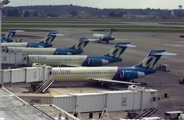 Some of AirTran's jets as seen from their control tower above Concourse C at Hartsfield-Jackson International Airport in 2003. As a low-cost carrier, AirTran was known for competitive fares and for service that attracted people looking for an alternative to big legacy carriers like Delta. AJC file photo