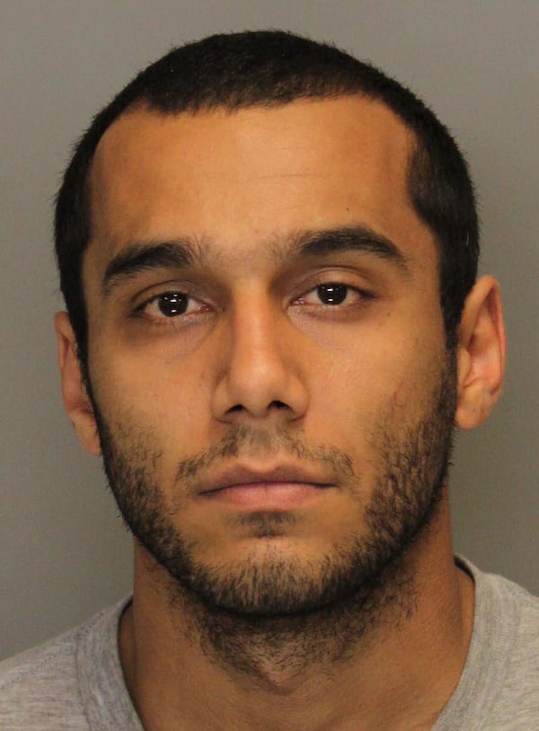 Tansu Kanlica, 27, of Atlanta, was arrested several miles away from where he allegedly struck three pedestrians, killing one, Sunday night, Cobb County police said.