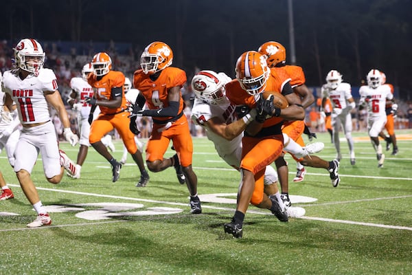 On fourth down, Parkview running back Trelain Maddox (2) runs for a first down to setup their game-winning touchdown against North Gwinnett in the fourth quarter at Parkview High School, Friday, September 8, 2023, in Lilburn, Ga. Parkview won 35-32. (Jason Getz / Jason.Getz@ajc.com)