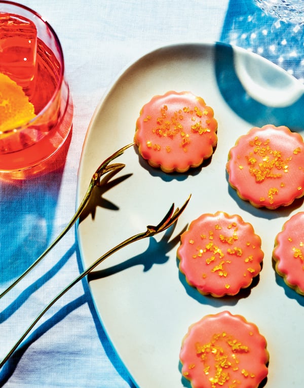 Jesse Szewczyk shows how to dress up a basic butter cookie for a night on the town with just a few well-chosen ingredients in Campari Shortbread Cookies with Crunchy Orange Sugar.  From “Cookies: The New Classics” by Jesse Szewczyk (Potter, $27.50). (Courtesy of Chelsea Kyle)